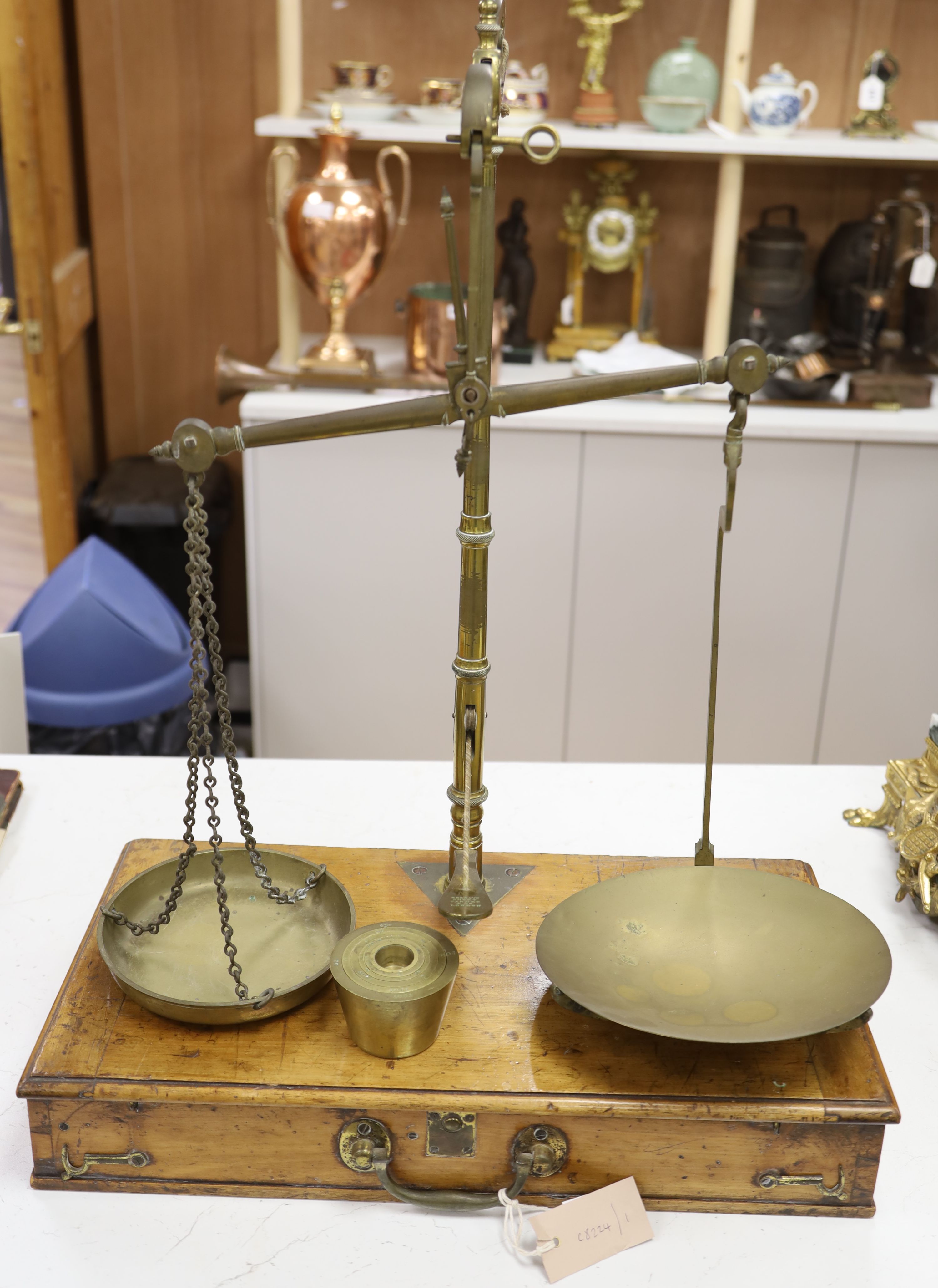 A set of Victorian mahogany cased brass scales by De Crave, Short Fanner & Co, width 50cm height 70cm